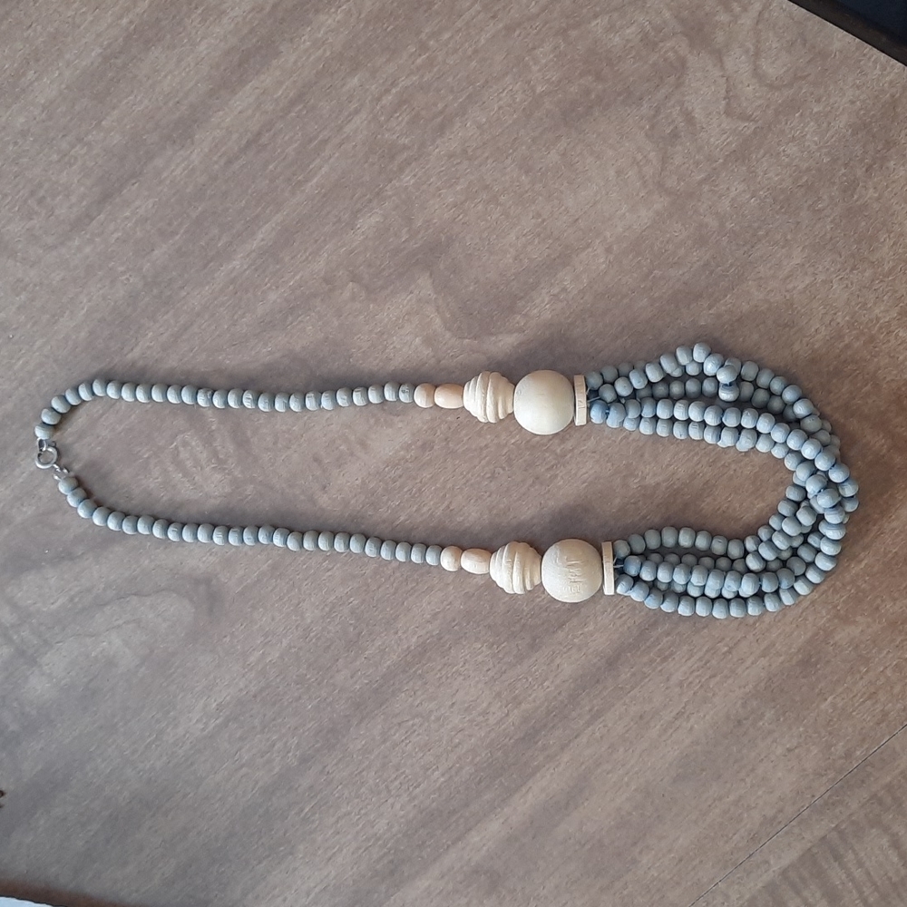 Wooden bead layered necklace.
